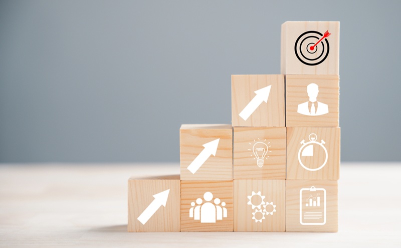 Image of blocks depicting the challenges and steps to a target