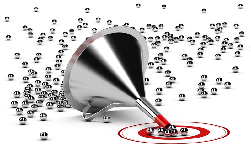 Image of funneling many ball bearings to a target, representing the bottlenecks in drug development