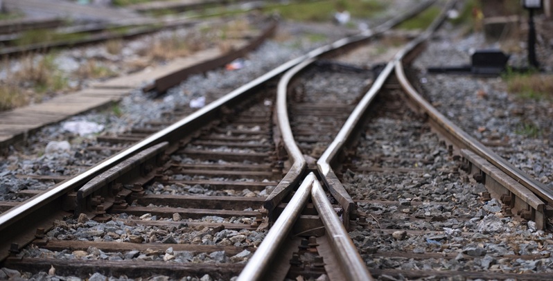 Image of train two train tracks converging