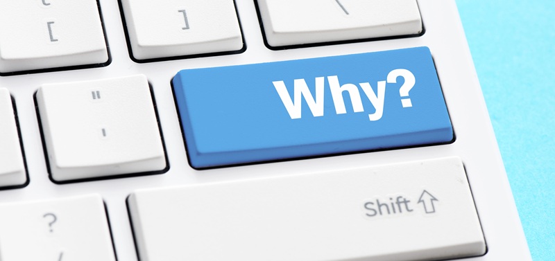 Computer Keyboard with the word WHY on a key