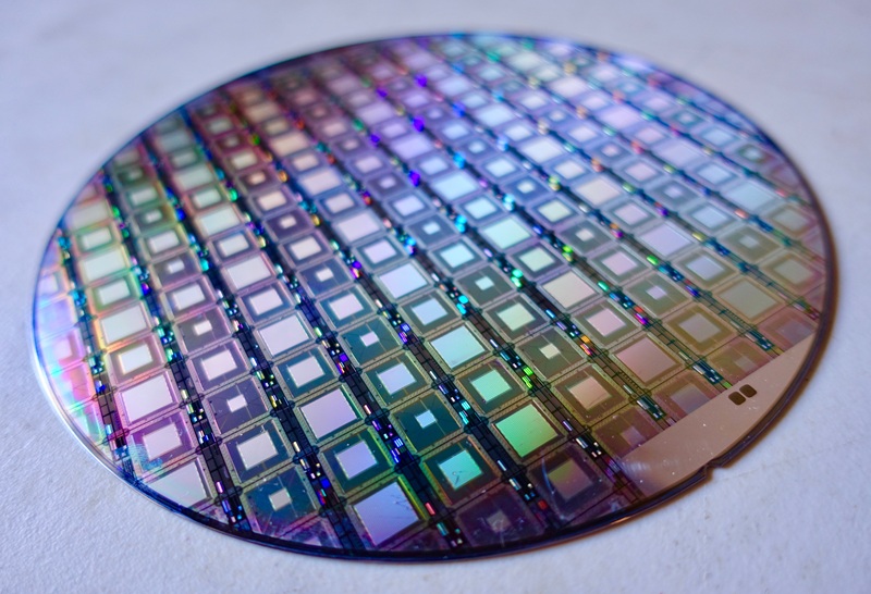 A circular Wafer of the Latest D-Wave Quantum Computers