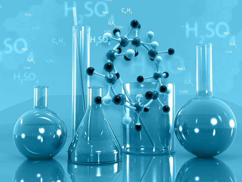 Image of a lab bench with molecular structure in the foreground and flasks and beakers and floating chemical formulas in the background.